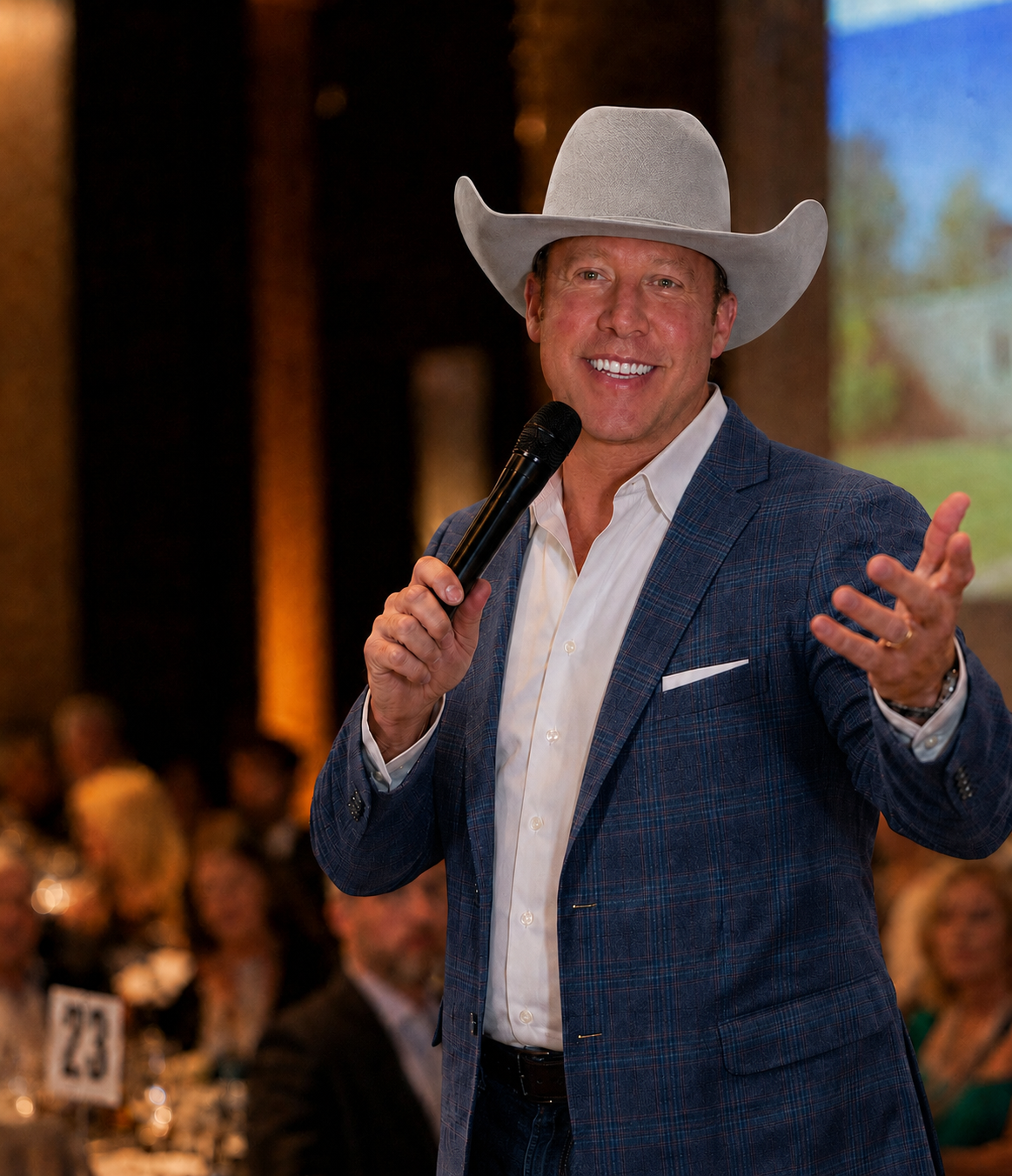 Smith Alan Baggett auctioneering at a charity gala